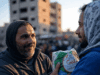 UK Boosts Aid to Gaza Amid Israel-Hamas Conflict Escalation Alt Text: Humanitarian aid workers distributing supplies in Gaza during Israel-Hamas conflict.